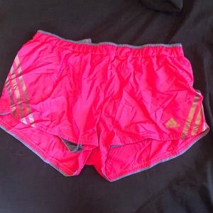 Pink adidas track shorts